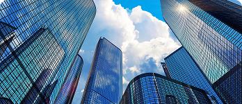Commercial locksmith working on a shopfront door
